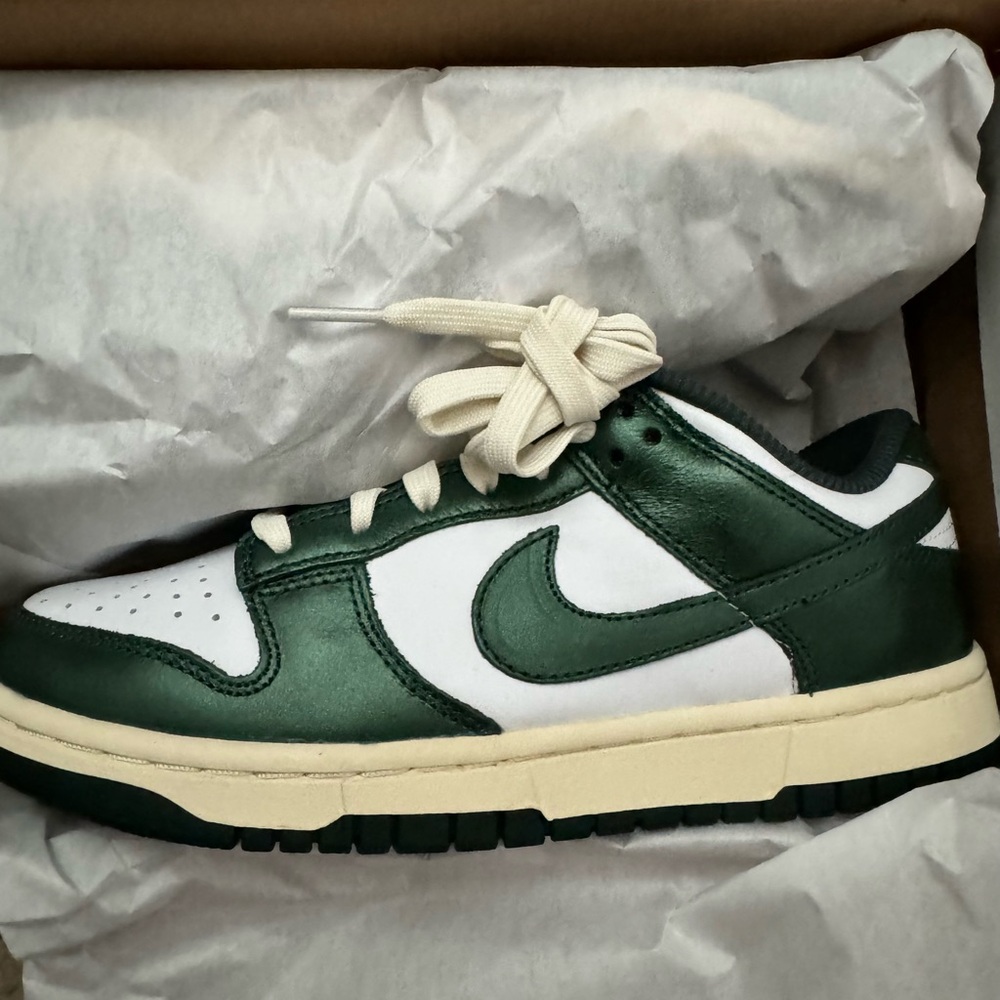 Green and white Nike Dunks